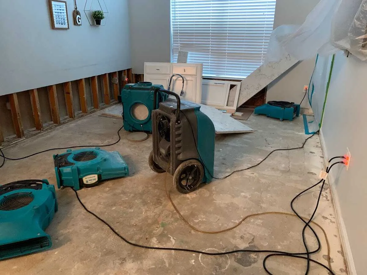 Dehumidifier in flood-cut room for Water Damage Restoration in New York